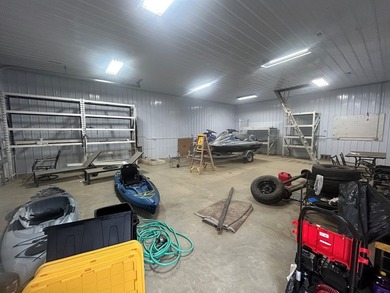 Enjoy nearly an acre of level waterfront property where the - photo 17