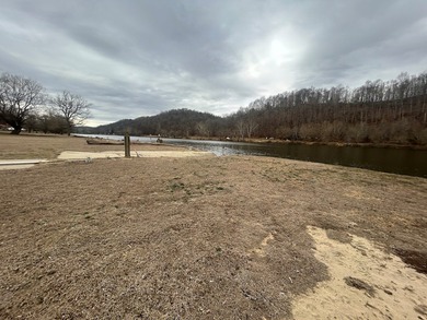 Enjoy nearly an acre of level waterfront property where the - photo 20