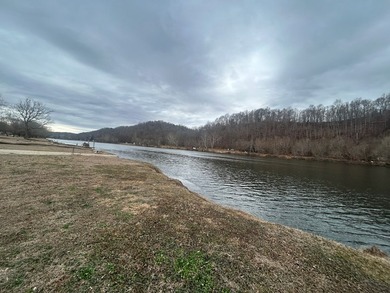 Enjoy nearly an acre of level waterfront property where the - photo 23