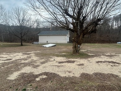Enjoy nearly an acre of level waterfront property where the - photo 24