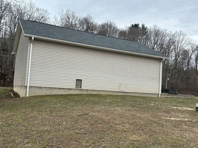 Enjoy nearly an acre of level waterfront property where the - photo 25