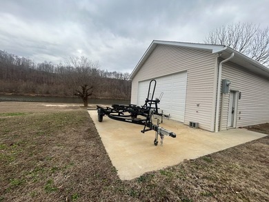 Enjoy nearly an acre of level waterfront property where the - photo 27
