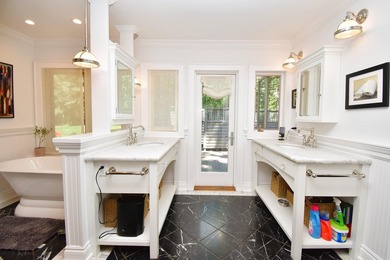 Elegant custom home with a detached guest house in Starweather - photo 24