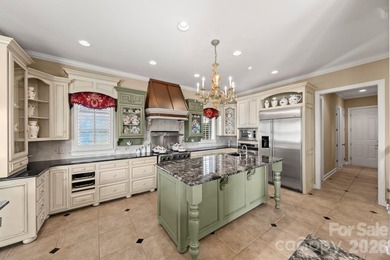 Exquisite French Country waterfront estate in the gated - photo 12