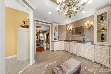 Exquisite French Country waterfront estate in the gated - photo 17