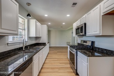 Beautifully updated home featuring an open floor plan, vaulted - photo 3