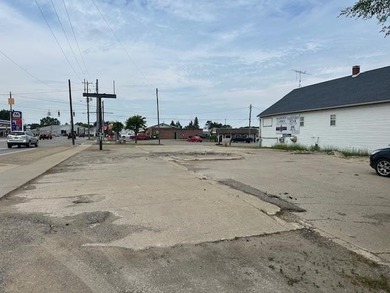 Budd Lake Commercial For Sale in Harrison Michigan