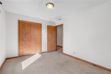 BRAND NEW ROOF!! Situated on 3/4 of an acre in a private setting - photo 14