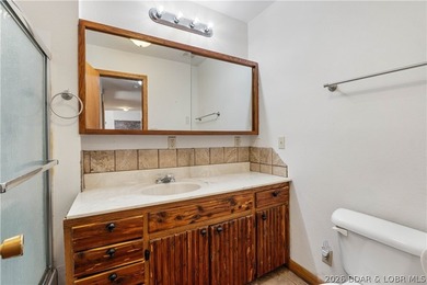 BRAND NEW ROOF!! Situated on 3/4 of an acre in a private setting - photo 19