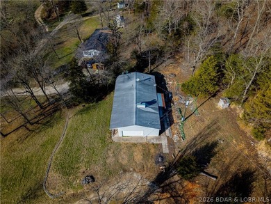 BRAND NEW ROOF!! Situated on 3/4 of an acre in a private setting - photo 32