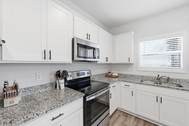 This 4-bedroom, 3 full-bath home offers a spacious and - photo 12