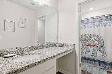 This 4-bedroom, 3 full-bath home offers a spacious and - photo 18