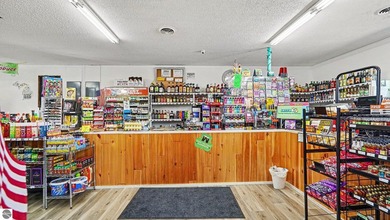 This store has everything you could need from beer, liquor - photo 4
