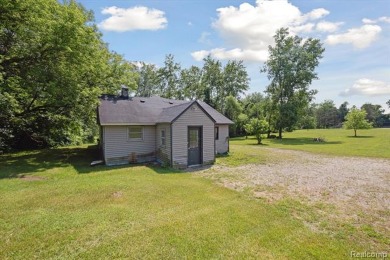 Lake Home For Sale in Oxford, Michigan