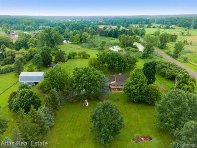 (private lake, pond, creek) Home For Sale in Goodrich Michigan