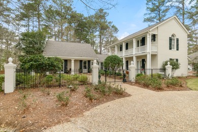This charming Southern residence is gracefully set behind a - photo 2