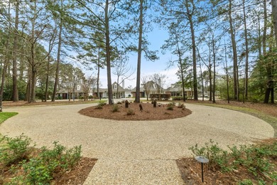 This charming Southern residence is gracefully set behind a - photo 6