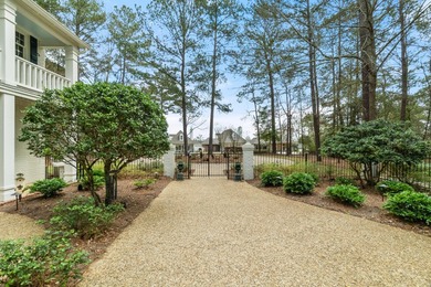 This charming Southern residence is gracefully set behind a - photo 7