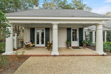 This charming Southern residence is gracefully set behind a - photo 9