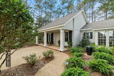 This charming Southern residence is gracefully set behind a - photo 10