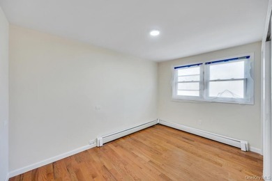 Welcome to this beautifully renovated 6-bedroom, 2-bath Colonial - photo 12