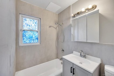 Welcome to this beautifully renovated 6-bedroom, 2-bath Colonial - photo 18