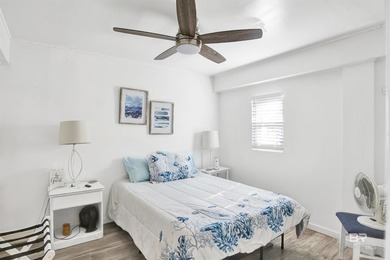 Beautifully upgraded bayfront home on a private road with no - photo 34