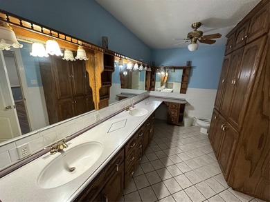 Two bedroom Two bath home on acreage metal roof nice pond with - photo 7