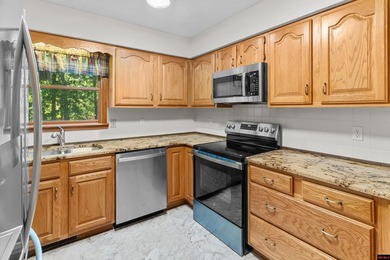 Spacious brick home on a beautiful corner lot offering over half - photo 11