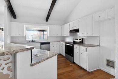 Spacious and well-maintained 4-bedroom, 2-bath home offering - photo 12