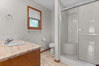 Spacious brick home on a beautiful corner lot offering over half - photo 24