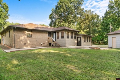 Spacious brick home on a beautiful corner lot offering over half - photo 33