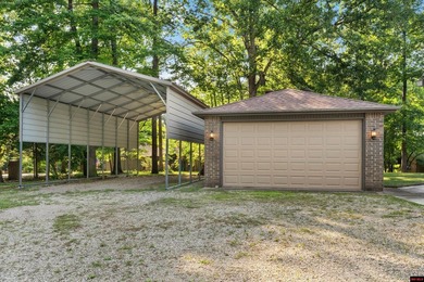 Spacious brick home on a beautiful corner lot offering over half - photo 34