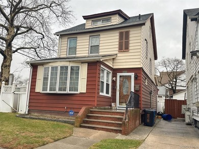 Income-producing two-family home located in the heart of Bayside - photo 1