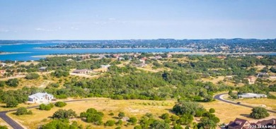 Pristine lot with a hilltop view of the Guadalupe River in a - photo 8