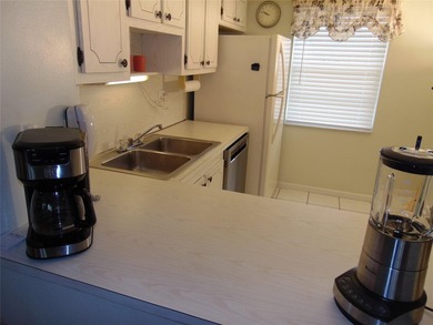 FIRST FLOOR. INCREDIBLE DEAL ON A 2 BEDROOM 2 BATH. BEAUTIFUL - photo 5