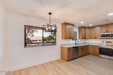 Beautifully remodeled condominium with stunning views of a - photo 8
