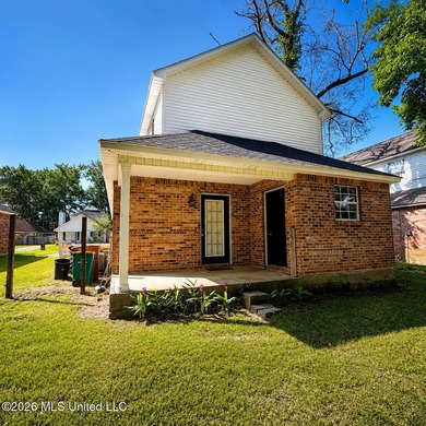 Conveniently located in the heart of D'Iberville, this two-story - photo 2