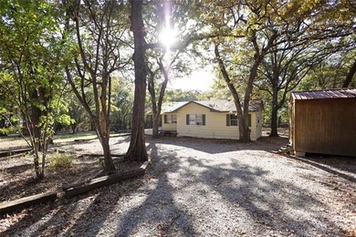 2.7 miles from the Guy Sandy ramp! This two bed, 1 bath home is - photo 2
