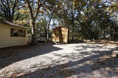 2.7 miles from the Guy Sandy ramp! This two bed, 1 bath home is - photo 3