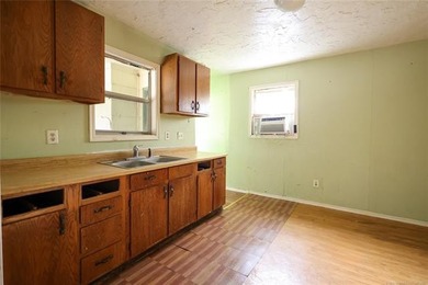 2.7 miles from the Guy Sandy ramp! This two bed, 1 bath home is - photo 7