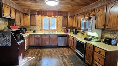 Gorgeous Swan Lake property with 202' frontage and dock located - photo 21