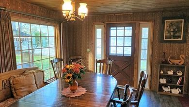 Gorgeous Swan Lake property with 202' frontage and dock located - photo 24