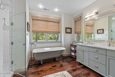 This beautiful 4-bedroom, 4.5-bathroom cottage offers 3,094 - photo 25