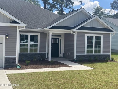 This is Adams Homes MODEL HOME in Fairfield Harbour. This is a - photo 2