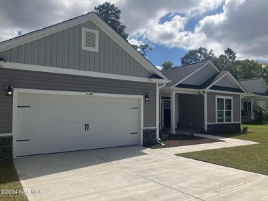 This is Adams Homes MODEL HOME in Fairfield Harbour. This is a - photo 3