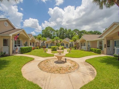 Beautiful move-in ready villa located in Kings Isle, a desirable - photo 2