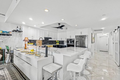 Beautifully upgraded 2 BR + den, 2 remodeled BA overlooking the - photo 6