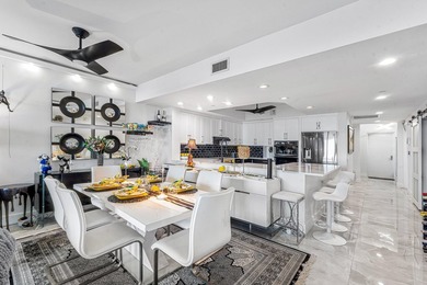 Beautifully upgraded 2 BR + den, 2 remodeled BA overlooking the - photo 9