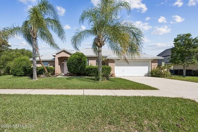 Welcome to this stunning lakefront retreat in the highly - photo 1